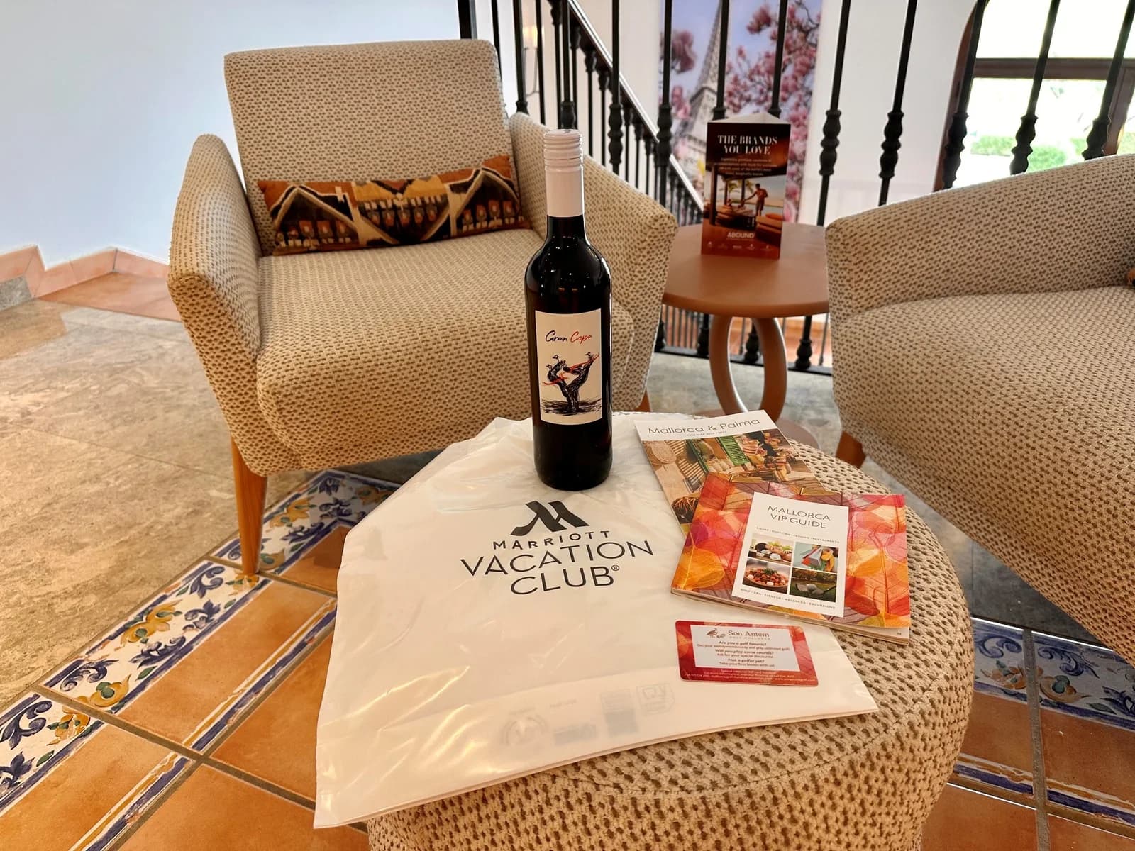 Welcome pack on a stool: bag, map and guide